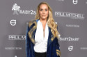 Elizabeth Berkley stars in a new Showgirls-inspired fashion campaign