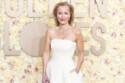 Gillian Anderson uses lipstick on her eyelids