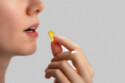 Woman taking pill